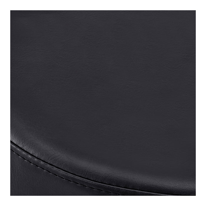 Close-up of DIR Panda Pedi Stool Black faux leather with stitching on the bottom left edge.