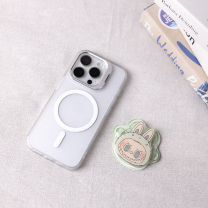 Phone case with a cute animal design on a light gray surface