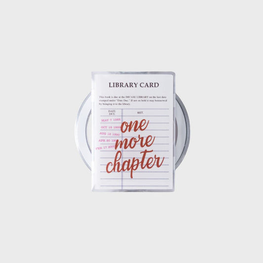 Library card with 'one more chapter' text on a white background