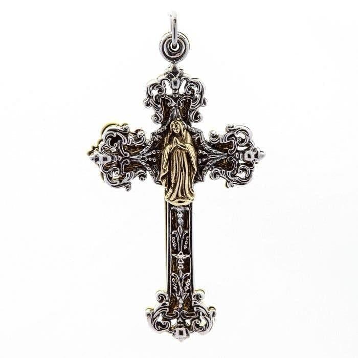 Straight-on full view capturing the intricate silver scrollwork frame, top bail, and central brass figure.