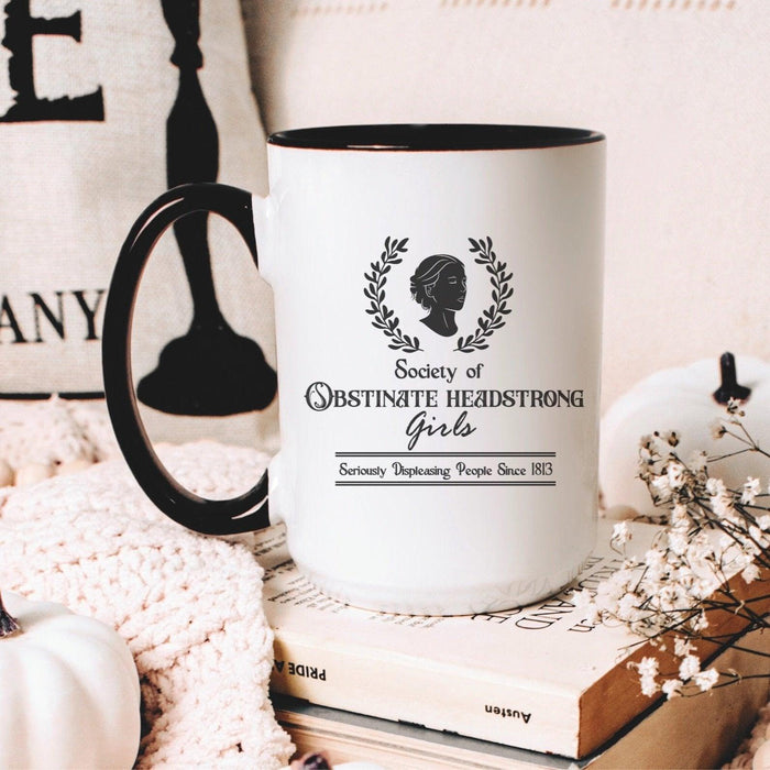 Obstinate Headstrong Girls Coffee Mug - The Bean Workshop - Black and White Graphic, ceramic mug, Dark Academia, Gift for Bookworms, jane austen, Jane Austen Tea Cup for Readers, Janeite, Laurel Wreath Design, Minimalist Aesthetic, Morning Coffee, mug, Obstinate Headstrong Girls Ceramic Mug, Silhouette Art
