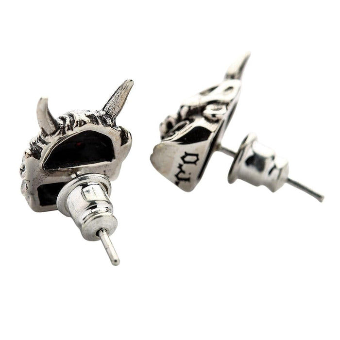 The back view of the Oni mask earrings, showing the solid silver construction and earring posts.