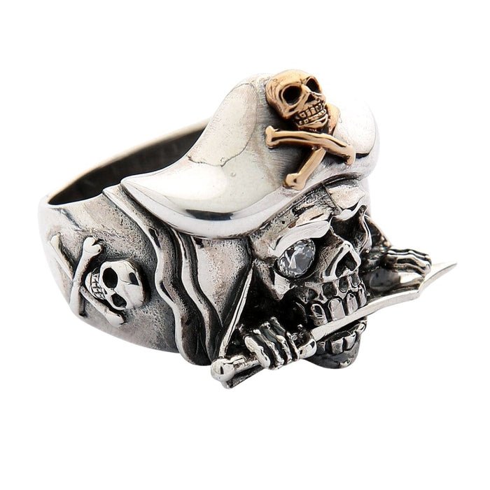 A premium biker ring designed as a detailed, treasure-laden pirate skull with a gold Jolly Roger.