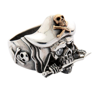 A premium biker ring designed as a detailed, treasure-laden pirate skull with a gold Jolly Roger.