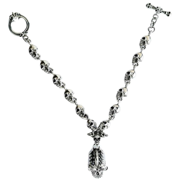 A classic rock and roll style skull link bracelet, expertly handcrafted from .925 sterling silver.