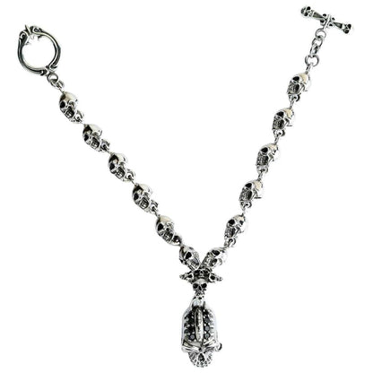 A classic rock and roll style skull link bracelet, expertly handcrafted from .925 sterling silver.