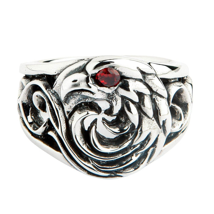 A powerful men's eagle ring in sterling silver, featuring a unique, stylized tribal design and a single, fiery red eye.