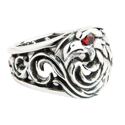 A beautifully handcrafted sterling silver eagle ring with a deep and brilliant red CZ stone set as its eye.