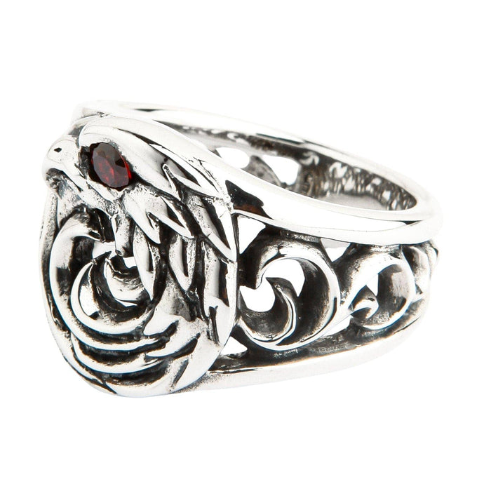 A unique tribal eagle ring in a dark, gothic style, with intricate, flame-like swirls carved in solid silver.