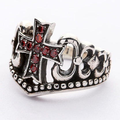 Angled close-up showing the intricate openwork scroll band and beaded edge detailing of the oxidized silver ring.