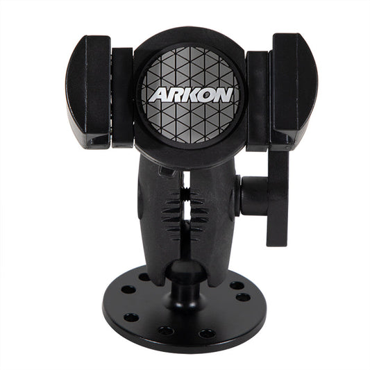The black RoadVise® XL Holder with a circular drill-base mount features adjustable arms for secure phone mounting on flat surfaces. The Arkon logo appears on the front.