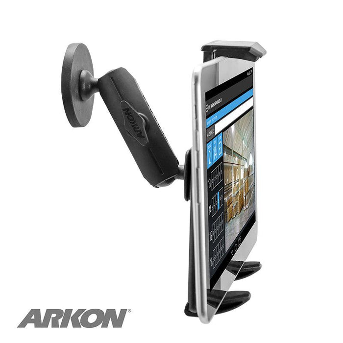 A Robust Magnetic Tablet Mount holds a tablet against a wall or flat surface. The tablet shows a warehouse management interface, and the Arkon logo appears in the bottom left corner.