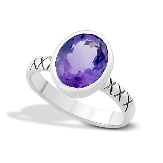 Samuel B. Sterling Silver Balinese Design Oval Salah Amethyst Ring, Size 7. Handcrafted in Bali by our skilled artisans. From our signature collection, Royal Bali™ featuring designs handcrafted using sterling silver, solid 18k gold accents and genuine gemstones. The February birthstone, Amethyst, is said to strengthen relationships and give its wearer courage. At one time, only royalty could wear the gem.