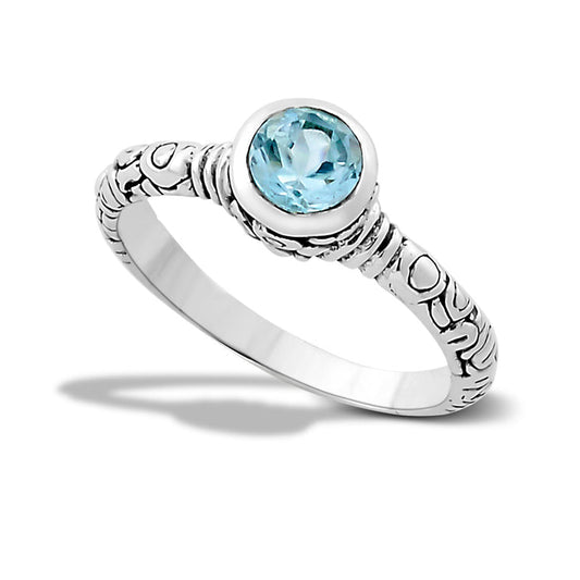 Samuel B. Sterling Silver Balinese Design Round Iyang Blue Topaz Ring, Size 7. Handcrafted in Bali by our skilled artisans. From our signature collection, Royal Bali™ featuring designs handcrafted using sterling silver and genuine gemstones. Blue Topaz symbolizes love and affection. It is believed to give the wearer increased strength and intellect.