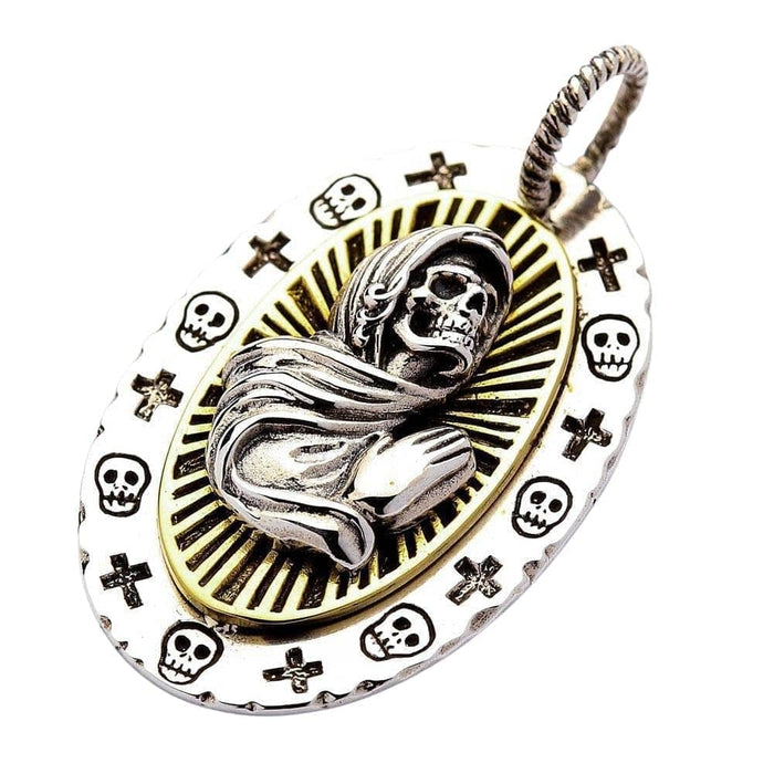 A detailed pendant of the praying skeleton Santa Muerte, a unique piece of Mexican folk art jewelry.