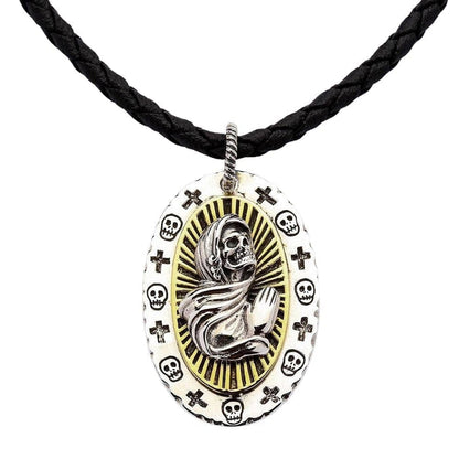 A piece of premium gothic religious jewelry: a complete Santa Muerte necklace with a braided leather cord.