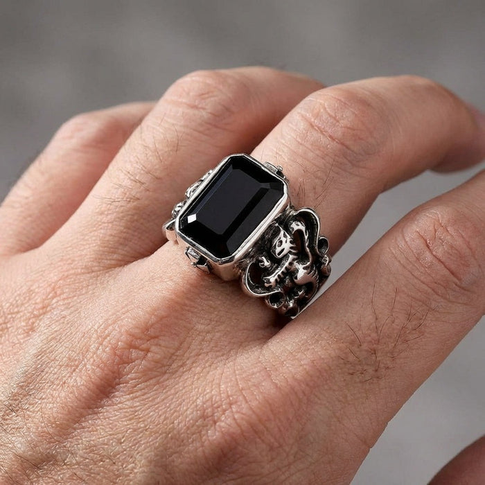 Black stone Scottish lion sterling silver ring worn on hand demonstrating fit and size