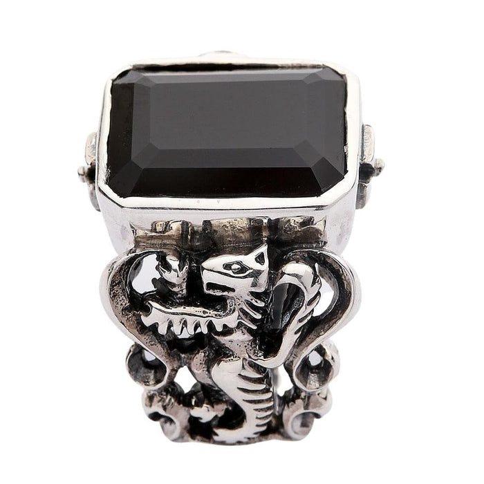 Men's Scottish lion ring with black gemstone top view showing lion motifs
