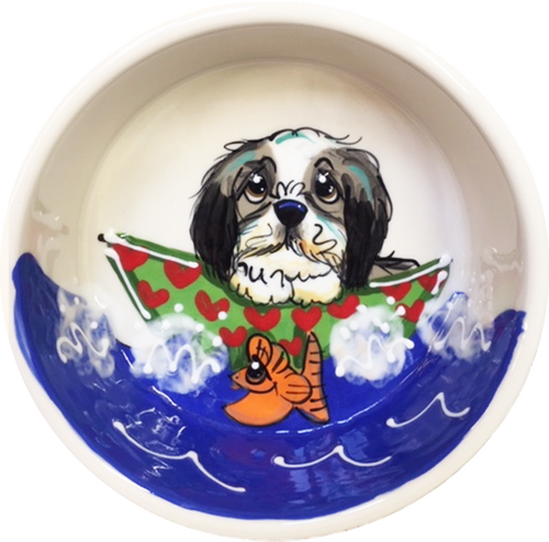 photo of ceramic dog bowl with black and white Shih Tzu in a small boat by Debby Carman, faux paw petique