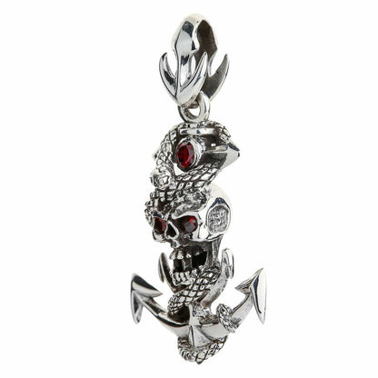 Three quarter left angle view of sterling silver skull anchor pendant showing snake scale detail