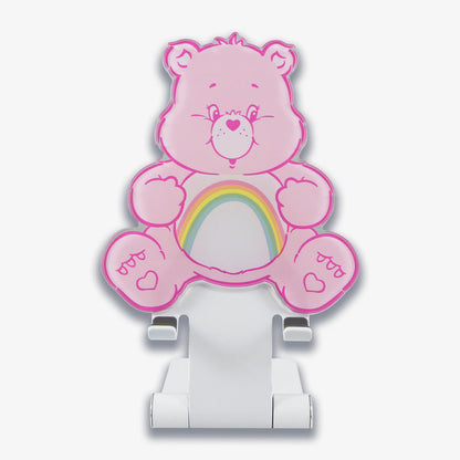 Front view of Sonix x Care Bears Cheer Bear phone stand showing pink bear face and rainbow belly on a white foldable stand