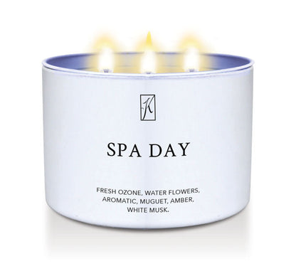 Candle in a white container labeled 'SPA DAY' with a logo on a white background