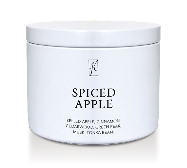 White container of 'Spiced Apple' candle with brand logo on a white background