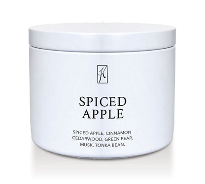 White container of 'Spiced Apple' candle with brand logo on a white background