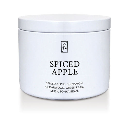 White container of 'Spiced Apple' candle with brand logo on a white background