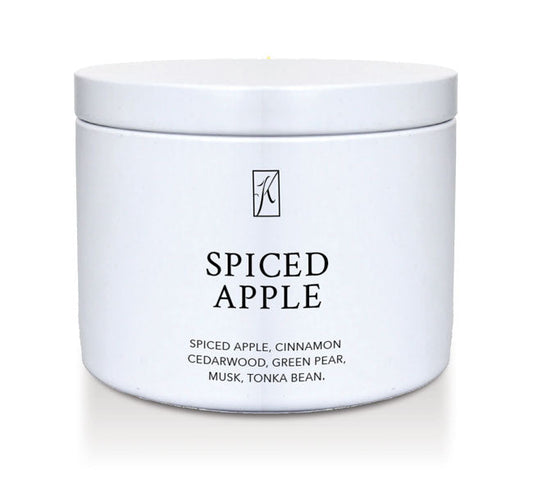 White container of 'Spiced Apple' candle with brand logo on a white background