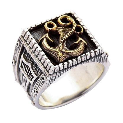 A premium piece of authentic Viking jewelry: a solid sterling silver and brass ring with a powerful anchor symbol.