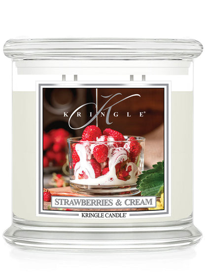 Kringle Candle with 'Strawberries & Cream' flavor packaging on a white background