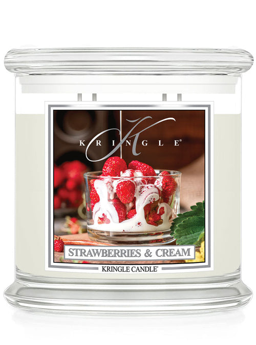 Kringle Candle with 'Strawberries & Cream' flavor packaging on a white background