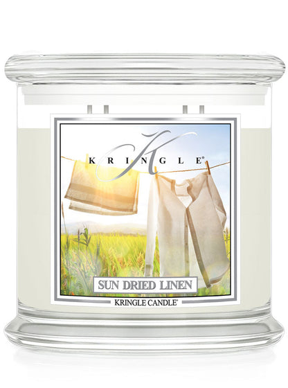 Kringle Candle with 'Sun Dried Linen' label on a white background