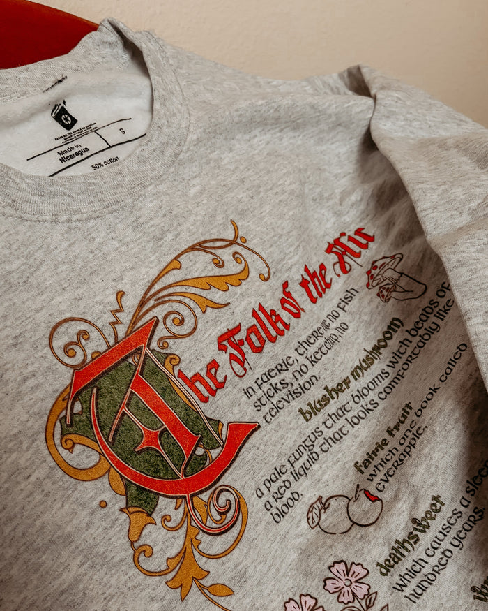 The Folk of the Air Sweatshirt - The Bean Workshop - Bestiary Design, Bookish Sweatshirt, Cardan Greenbriar, Cozy fantasy clothing, Dark Fantasy, Elfhame merch, Faeriecore, Folk of the Air sweater for readers, Goblincore Aesthetic, Holly Black licensed apparel, Jude Duarte, Literary Gift, The Cruel Prince sweatshirt