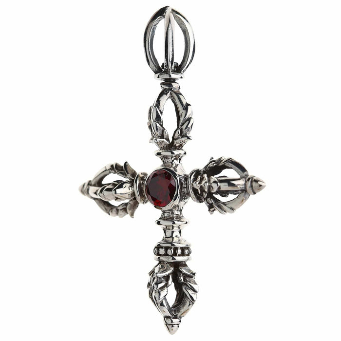 Ornate vajra prong tips of the sterling silver dorje pendant seen from a three-quarter angle