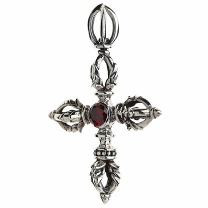 Ornate vajra prong tips of the sterling silver dorje pendant seen from a three-quarter angle