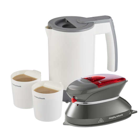 A travel iron and travel kettle set with a white kettle, grey iron, and two white cups filled with a liquid, all designed for travel use.