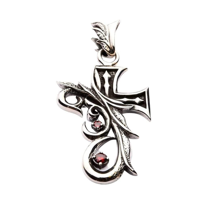 Front view of the sterling silver cross pendant with vibrant red cubic zirconia accents.
