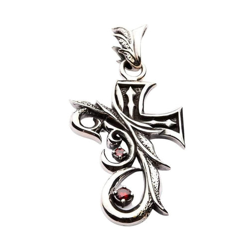 Front view of the sterling silver cross pendant with vibrant red cubic zirconia accents.