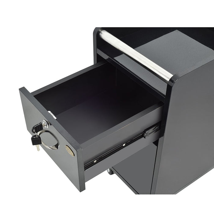 The Pedi-Mani Trolley Cart Black DIR by DIR has its lockable drawer open, showing it's empty.