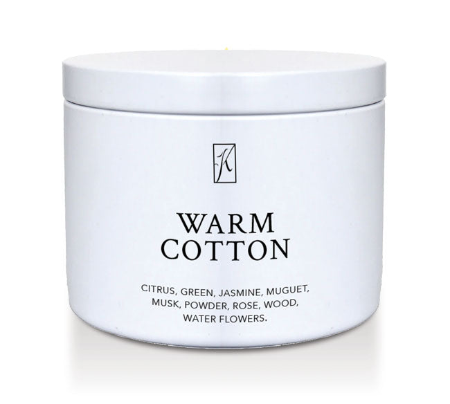 White container of 'Warm Cotton' fragrance with brand logo on a white background