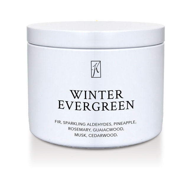 White container of 'Winter Evergreen' candle with a brand logo on a white background