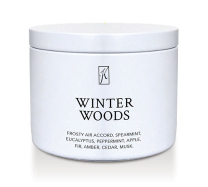 Jar of 'Winter Woods' candle with brand logo on a white background
