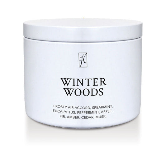 Jar of 'Winter Woods' candle with brand logo on a white background