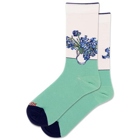 Green sock with floral design on a white background