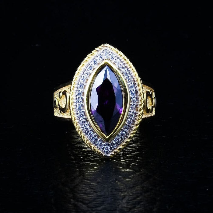 The women's statement bishop ring, showcasing its substantial size and the vibrant purple amethyst stone against a black background.
