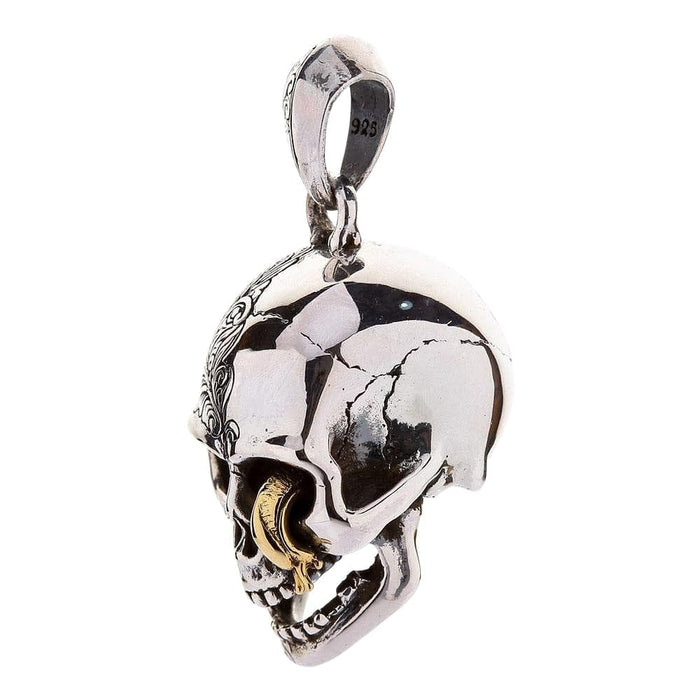 The gothic worm skull pendant, displaying the depth of the design and brass accent.